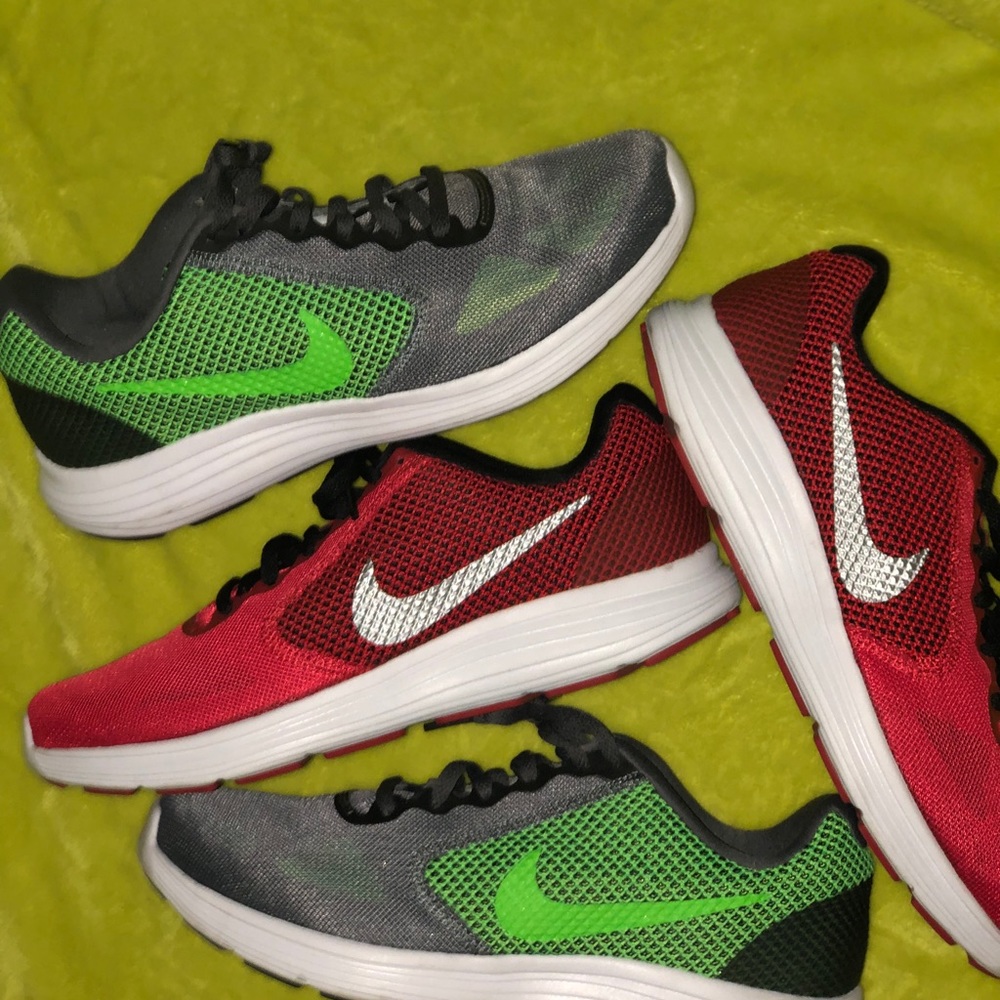 Red and yellow Nike revolution running shoes